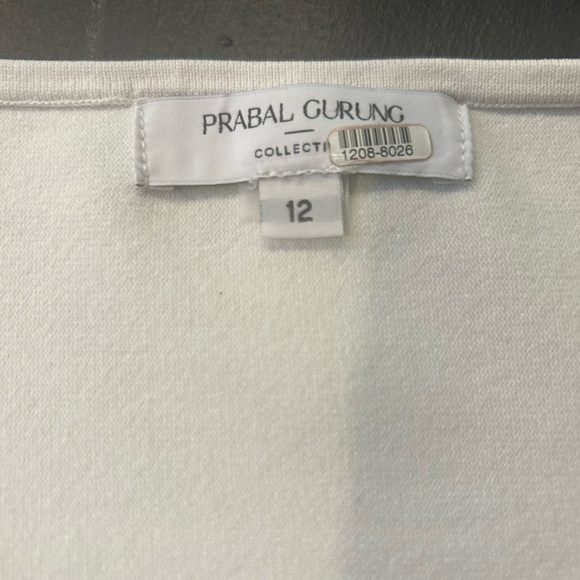 Prabal Gurung Peplum White with Black Stitching Asymmetrical Top. - Picture 5 of 7